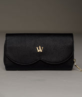 Gaia – Bolso porta celular negro en cuero compacto y elegante